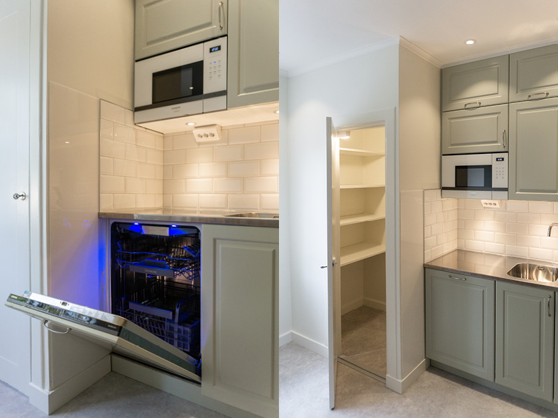 nomenu Modernt kök med öppet skafferi, inbyggd diskmaskin och mikrovågsugn, gröna skåp, vita kakelplattor och rostfri diskbänk.