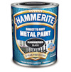Färgburk med blå etikett för "Hammerite Direct to Rust Metal Paint" i svart, med text och bilder av ett staket.