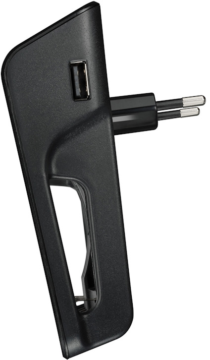 Svart laddare med europeisk elkontakt och en USB-port på sidan.