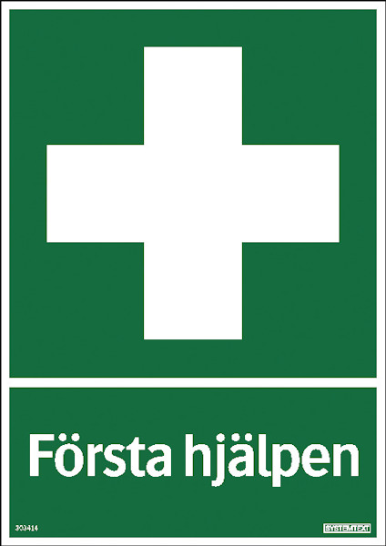 Grön rektangulär skylt med vitt kors och texten "Första hjälpen" längst ner.