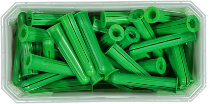 Gröna plastplugg i en transparent fyrkantig behållare.