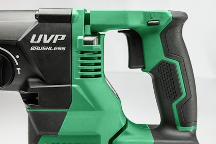 Grön och svart elektrisk handhållen borrliknande verktyg med texten "UVP BRUSHLESS".